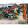 Excavadora de ruedas DOOSAN DX60W Mini excavadora de ruedas usada original de 6 toneladas de Corea a la venta